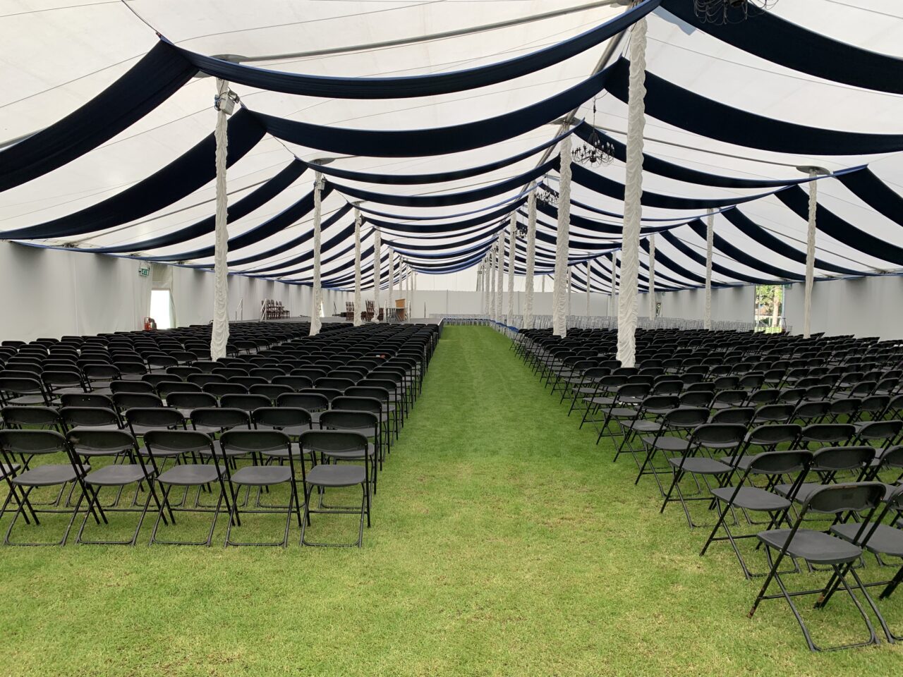 Flat floor seating inside graduation marquee solution for oundle school