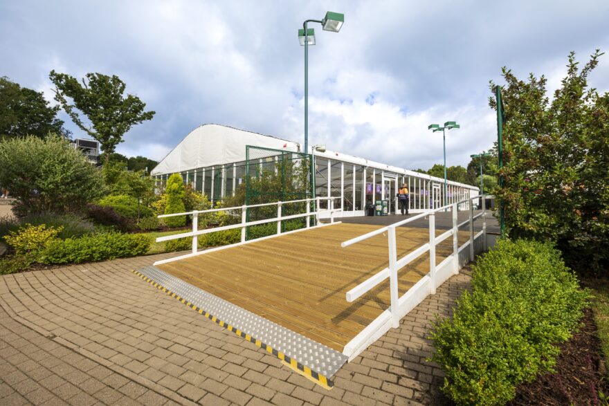 Temporary walkway, fencing and hospitality structures at Rothesay Classic Birmingham 2023, supplied by GL events UK